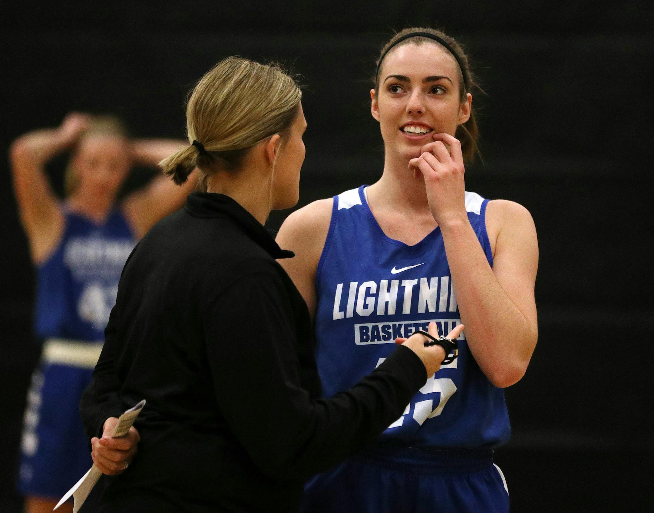Megan Walstad (45) talked with head coach Molly Kasper during practice. ] ANTHONY SOUFFLE &#xef; anthony.souffle@startribune.com The Eastview girls' basketball team, including Macy Guebert (21) and Megan Walstad (45) practiced Tuesday, Nov. 28, 2017 in Apple Valley, Minn. NOTE: Mariah Alipate (23) has been out with the flu.