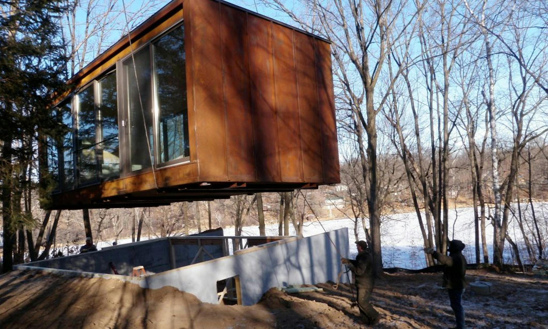 The prefab weeHouse is set on a foundation, which also will be finished. Decks, front and back,will be added, too.
