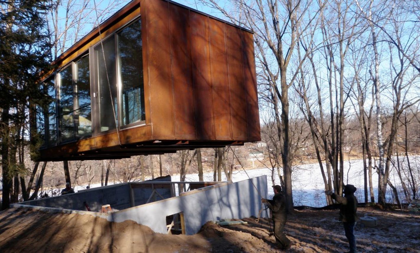 The prefab weeHouse is set on a foundation, which also will be finished. Decks, front and back,will be added, too.