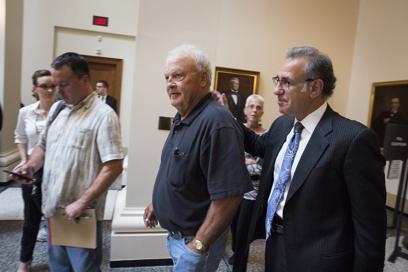 Steven Meshbesher, right, defense attorney for Byron Smith, walks with Bill Anderson, a neighbor and friend of Smith, after an appeal hearing before the Minnesota Supreme Court in St. Paul on Thursday, September 3, 2015. ] LEILA NAVIDI leila.navidi@startribune.com / BACKGROUND INFORMATION: Defense attorneys for Byron Smith, who was convicted of killing two teenage intruders in his Little Falls home, filed an appeal with the Minnesota Supreme Court arguing that Smith&#x2019;s trial was riddled wi