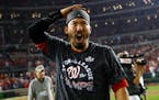 Former Twins and now Nationals catcher Kurt Suzuki whooped it up after Washington beat St. Louis 7-4 on Tuesday night to win the National League Champ