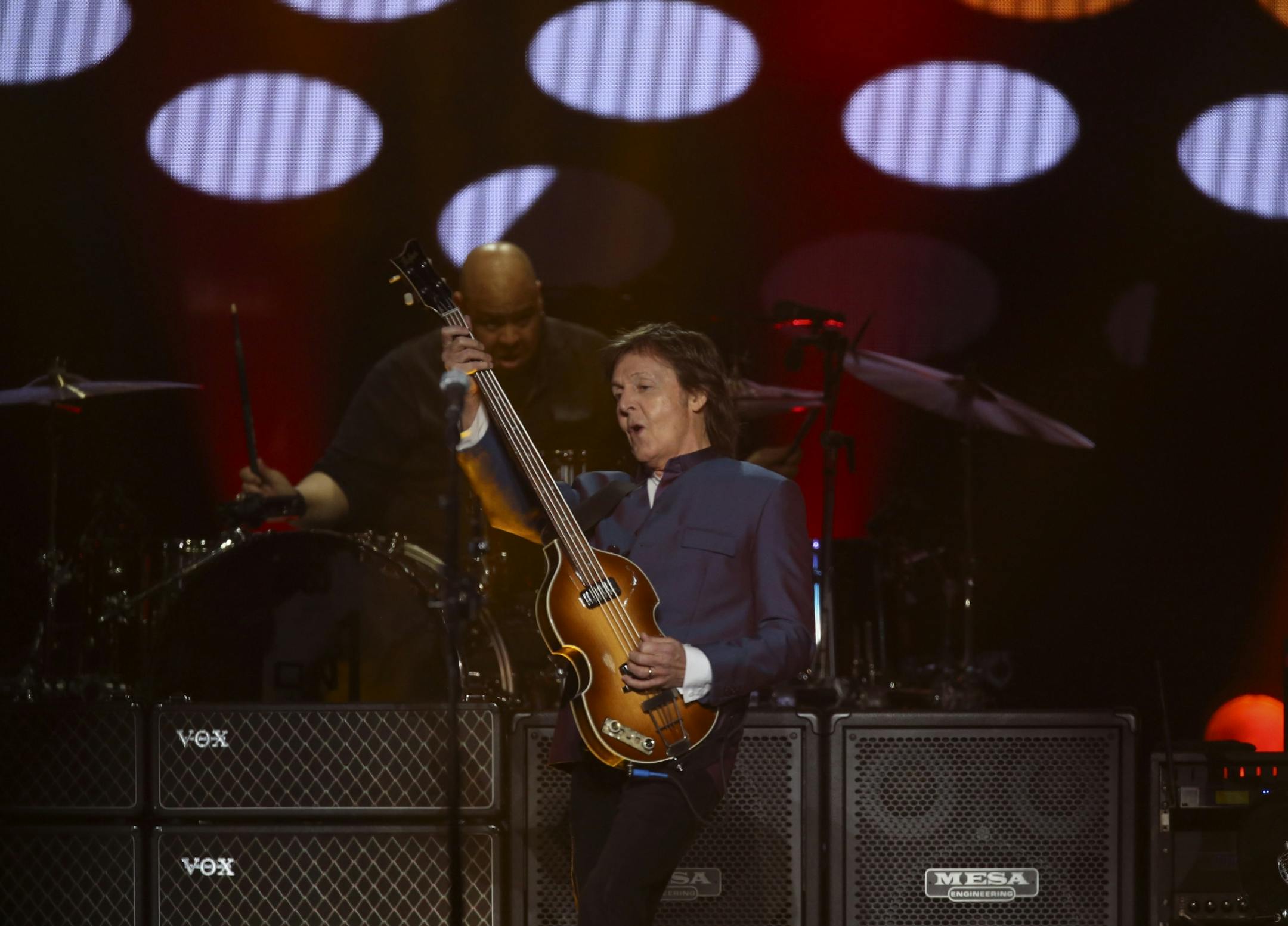 Paul McCartney played the final notes of "A Hard Day's Night," the first song of his set Wednesday night.