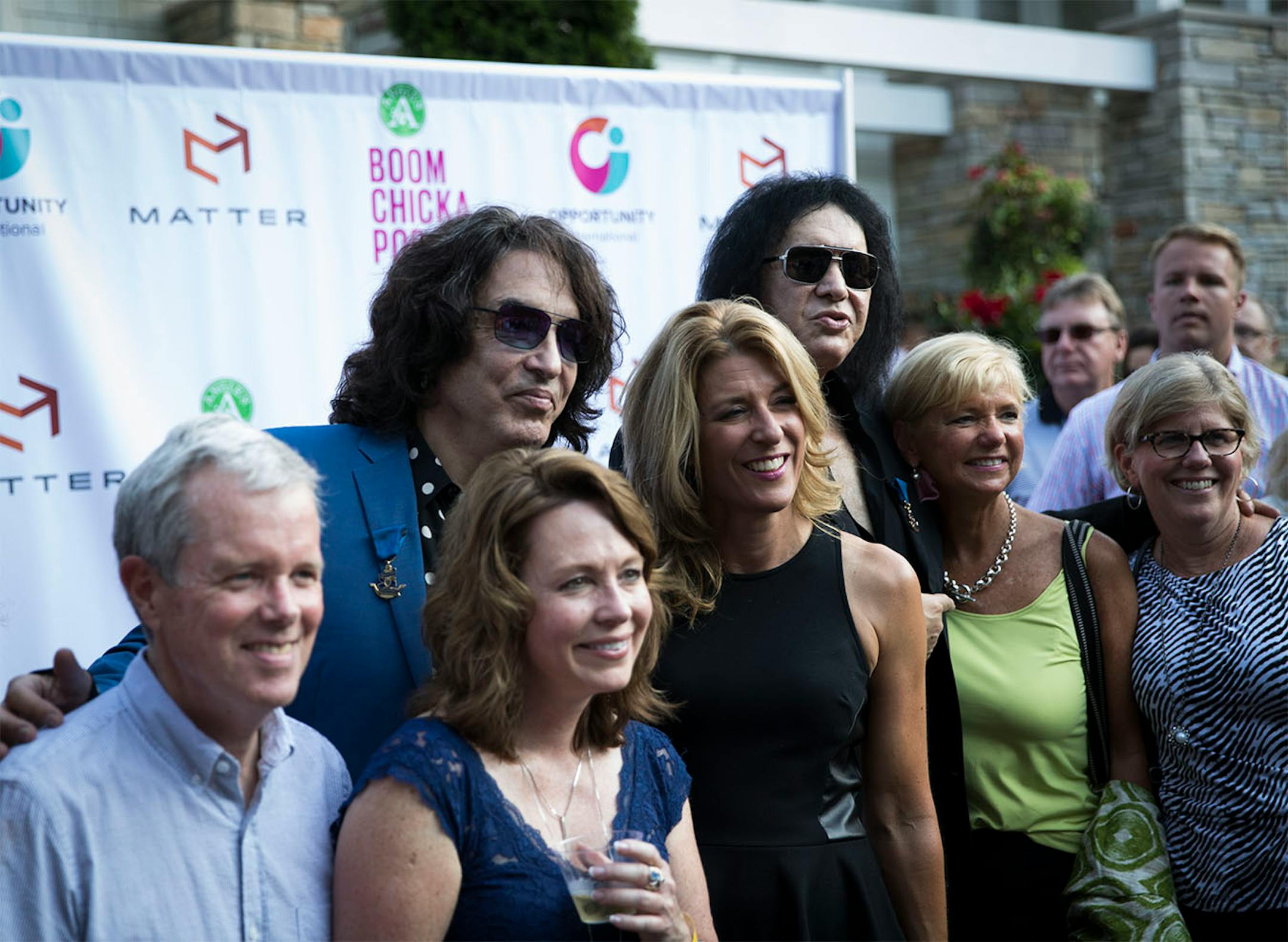 Kiss' Paul Stanley and Gene Simmons (both in glasses) posed for pictures before a charity event at the home of local philanthropist Martha "Muffy" MacMillan on Tuesday, August 2, 2016, in Long Lake, Minn.] RENEE JONES SCHNEIDER • renee.jones@startribune.com