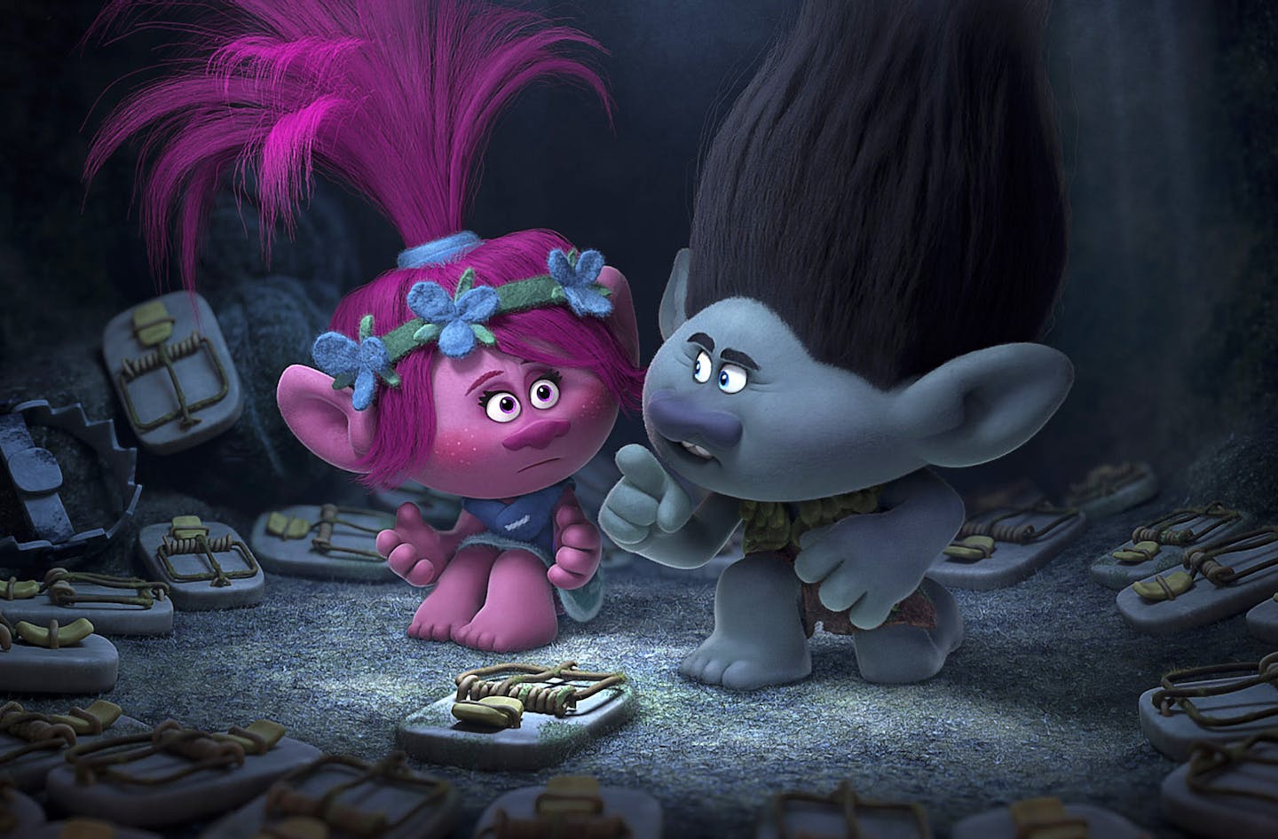 This image released by Dreamworks Animation shows characters Poppy, left, voiced by Anna Kendrick, and Branch, voiced by Justin Timberlake in a scene from "Trolls." (DreamWorks Animation via AP)