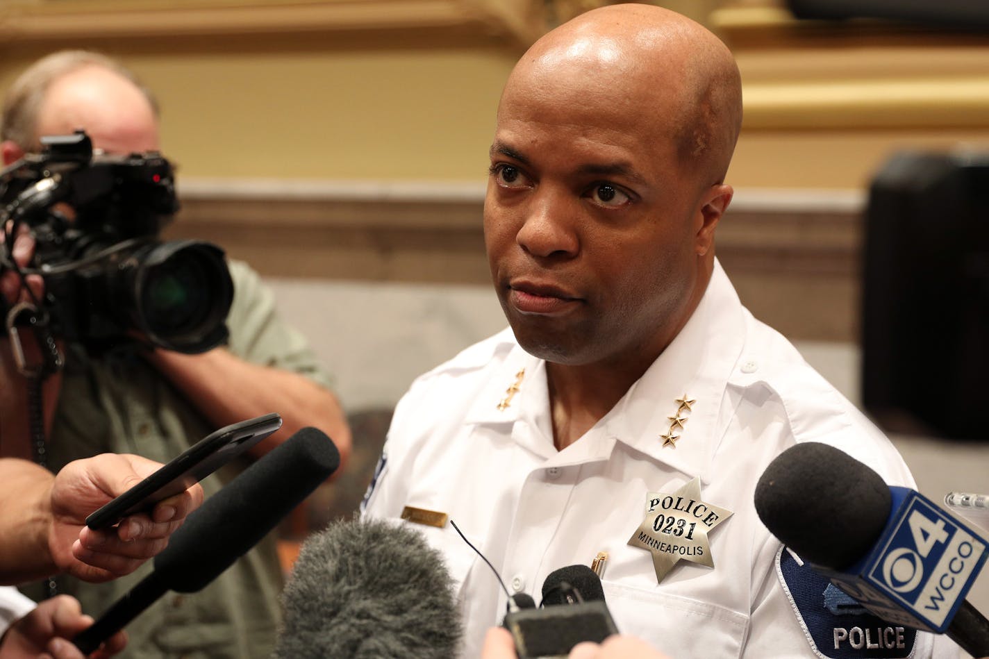 Acting police chief Medaria Arrodondo speaks with members of the media following Tuesday's meeting of the Minneapolis City Council executive committee.