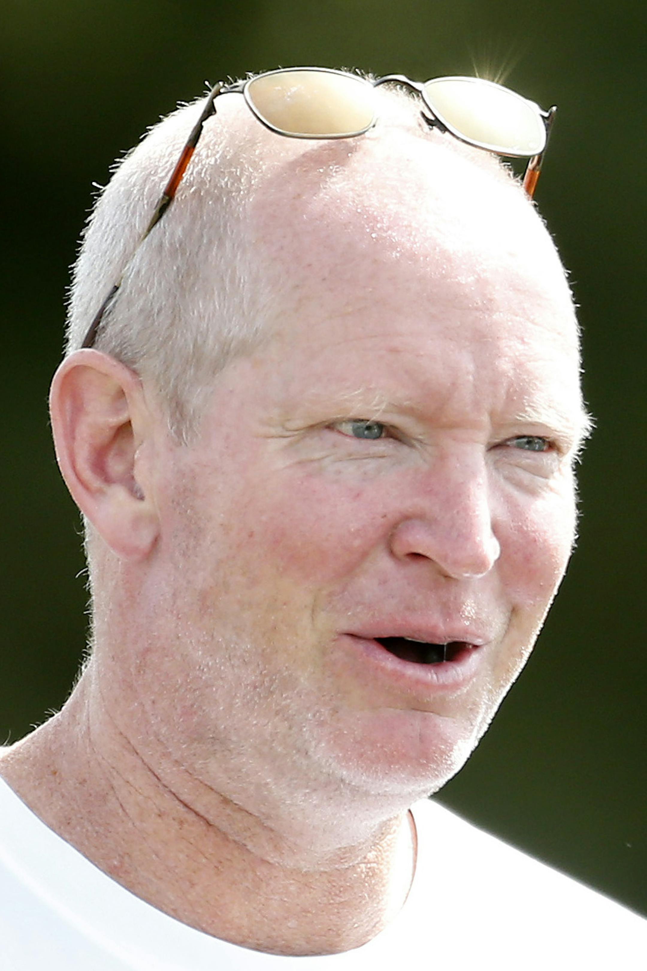 Minnesota Vikings offensive coordinator Bill Musgrave spoke with running back Adrian Peterson (28) during the morning practice on Monday.] CARLOS GONZALEZ cgonzalez@startribune.com July 29, 2013, Minnesota Vikings Training Camp, Mankato, Minn., Minnesota State University, Mankato - Morning practice