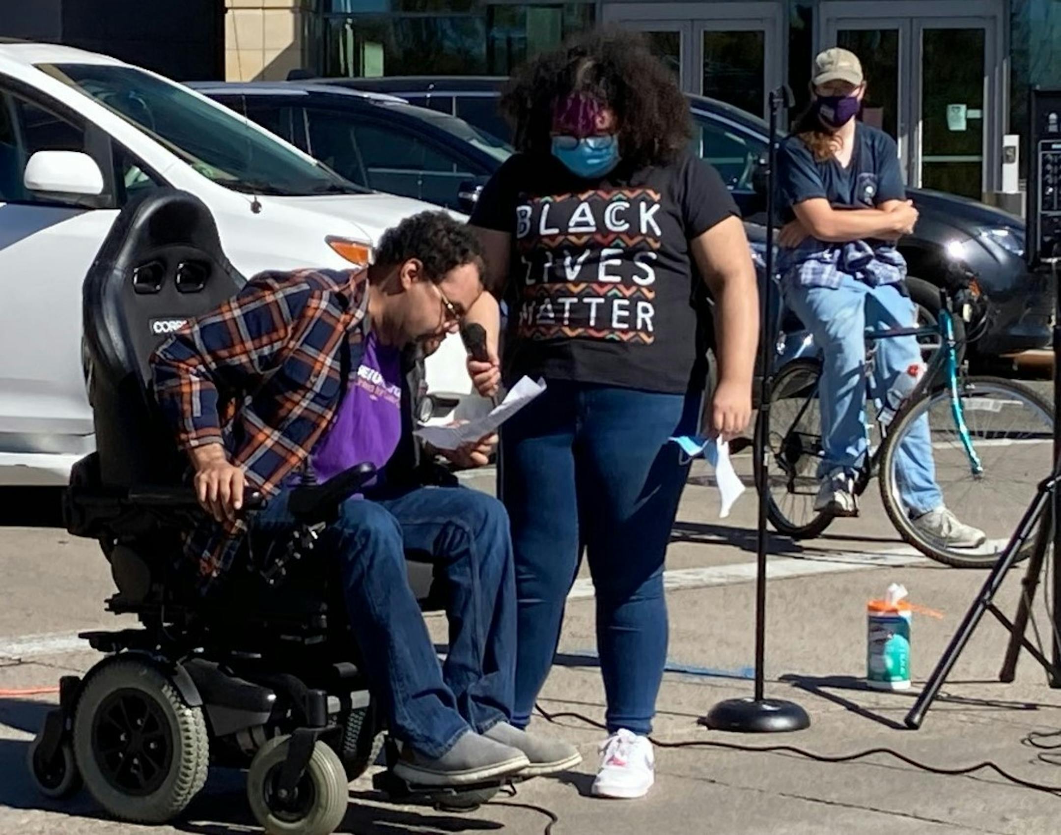 Photo by Katy Read: Jay Spika, who uses a wheelchair due to disabilities caused by muscular sclerosis and gets help from a home care aide, spoke at Saturday's rally.