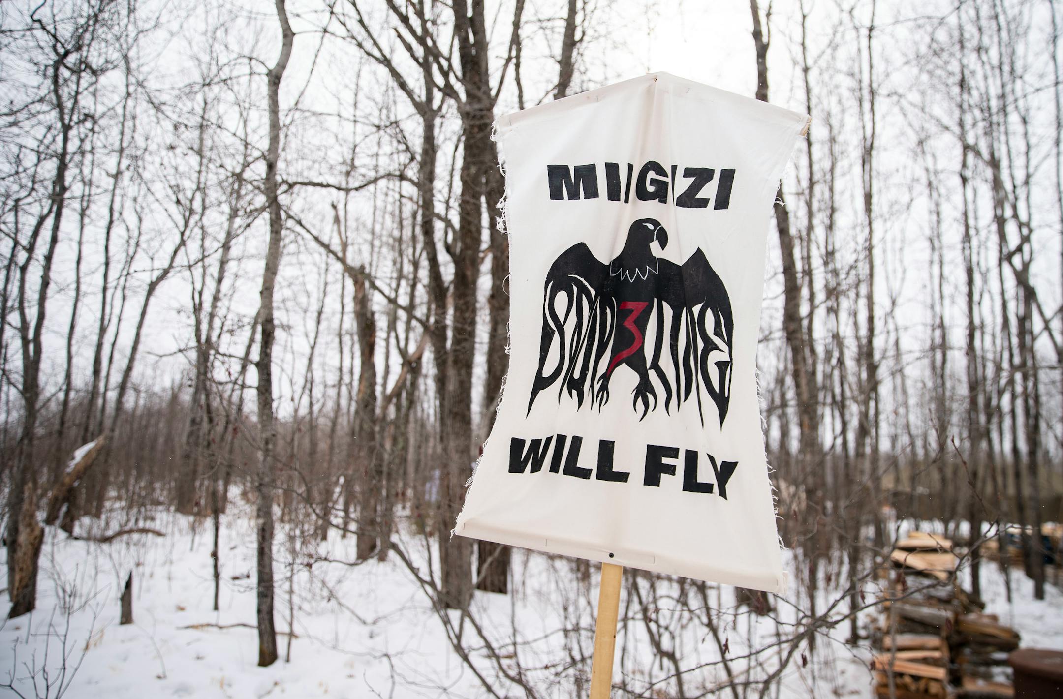 Signs are posted outside Camp Migizi, a small encampment of mostly indigenous water and land protectors located right beside the Enbridge Line 3 construction site on the Fond Du Lac Native American reservation in Cloquet.