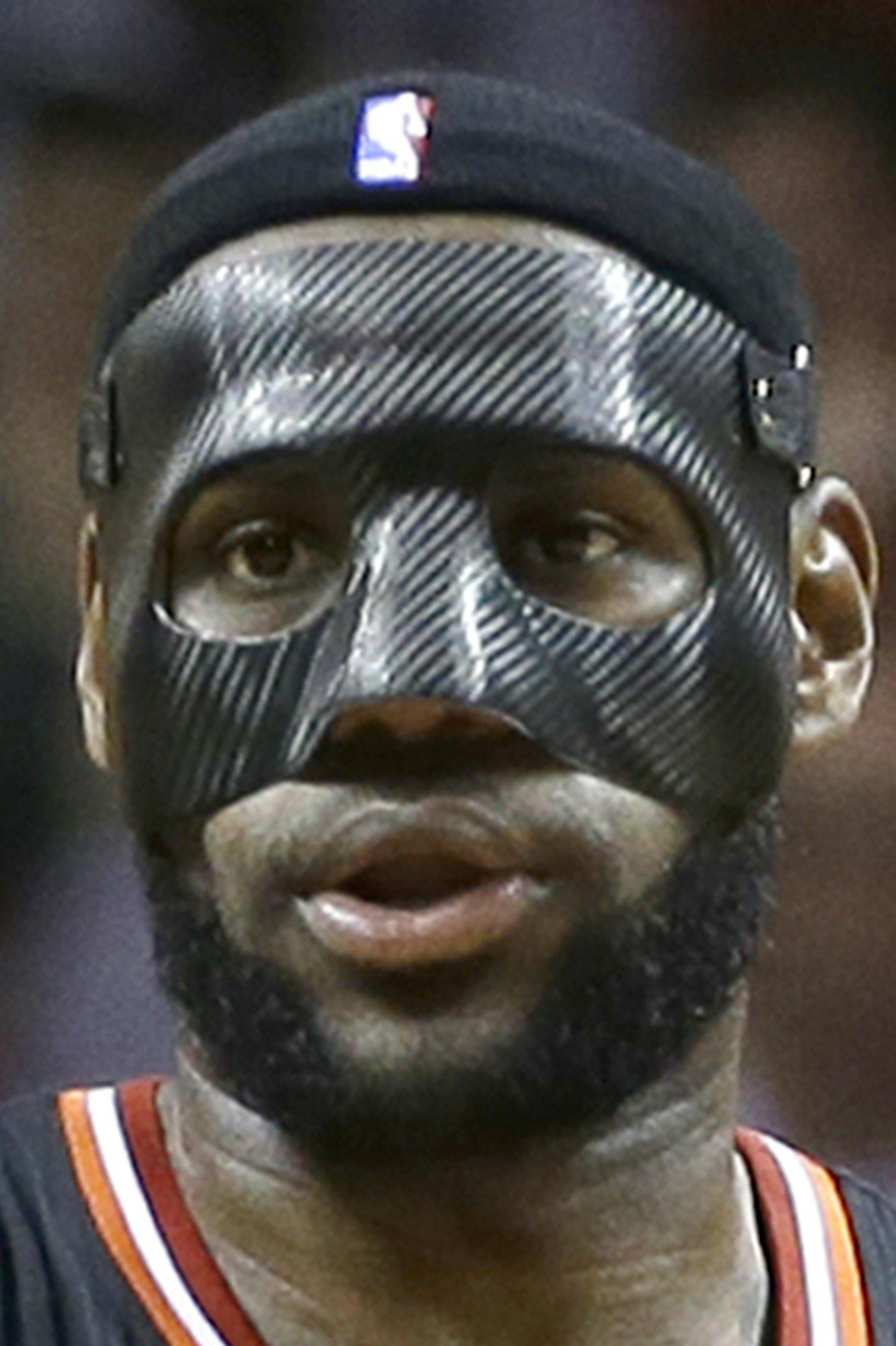 Miami Heat small forward LeBron James (6) gives instructions to teammates during an NBA basketball game against the New York Knicks in Miami, Thursday, Feb. 27, 2014. (AP Photo/Alan Diaz)