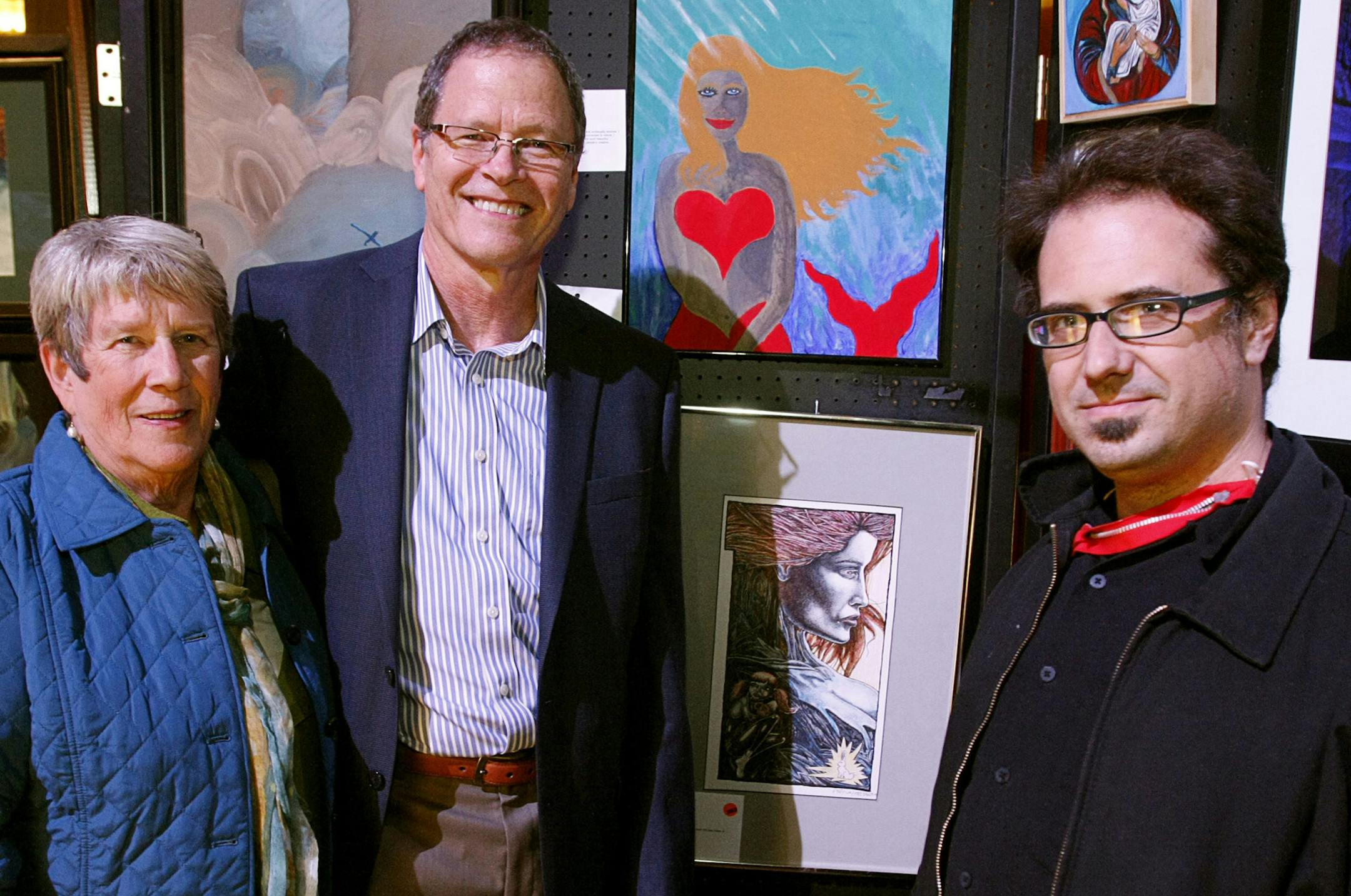 Lynn and Bart Galle, parents of the namesake for the Alex Galle Award, with this year's award winner Ethan Heidlebaugh during People Incorporated's 19th Annual Artability Art Show & Sale at the Landmark Center in St. Paul on Friday, October 25. ] Chris Kelleher, Special to the Star Tribune, 10/25/2013, St. Paul, MN.