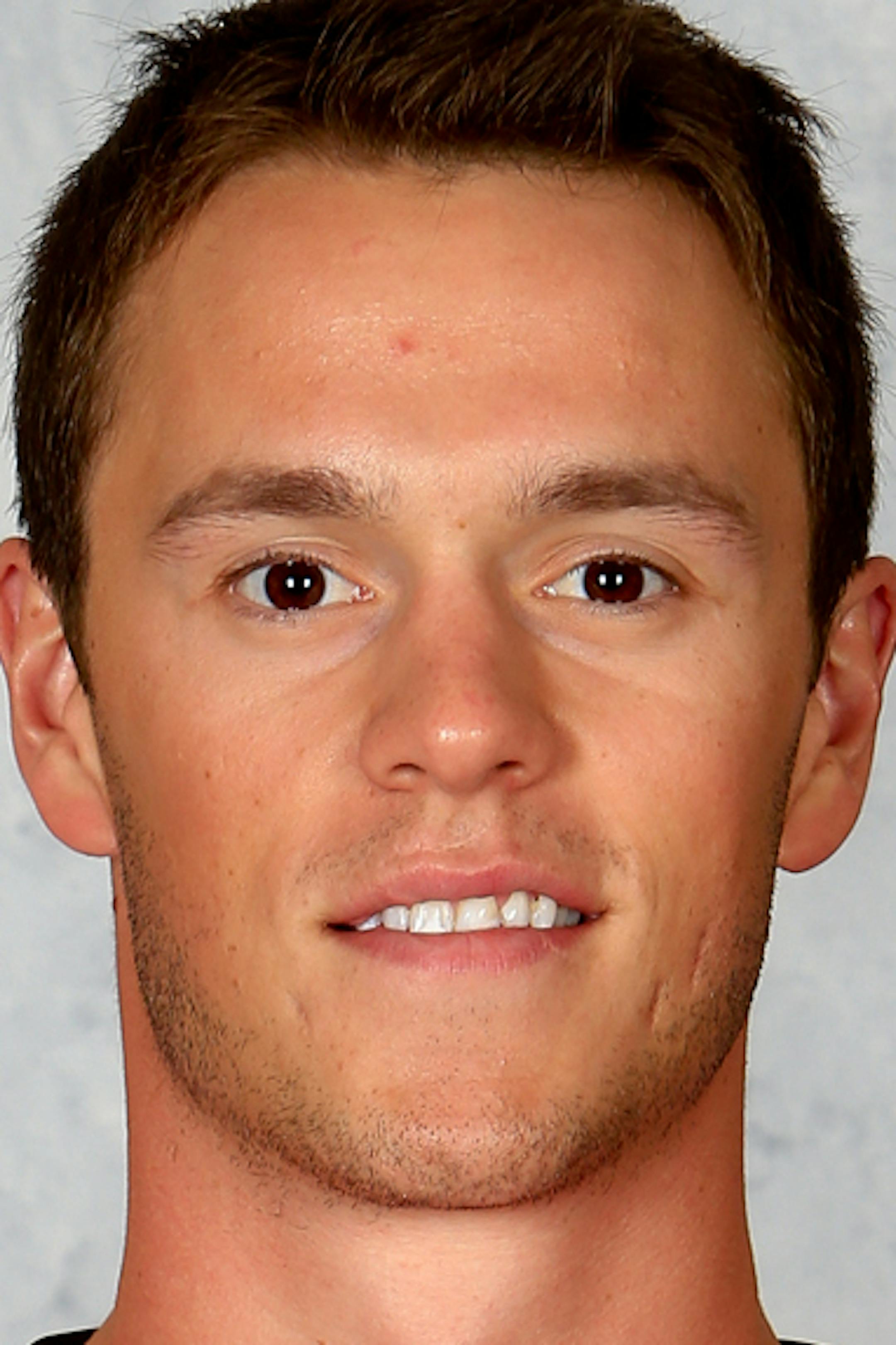 CHICAGO, IL ‚Äì September 11: Joanthan Toews #19 of the Chicago Blackhawks poses for his official headshot for the 2013-2014 season on January 13, 2013 at the United Center in Chicago, Illinois. (Photo by Chase Agnello-Dean/NHLI via Getty Images)*** Local Caption *** Jonathan Toews ORG XMIT: 177614218