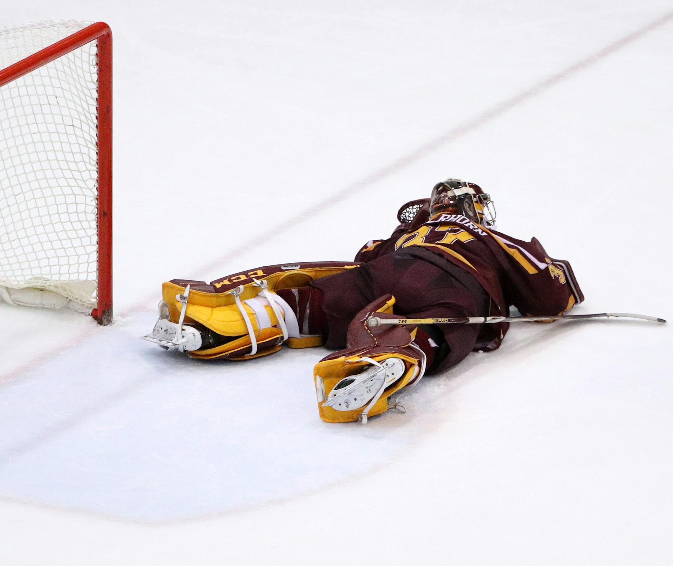 Minnesota Golden Gophers goaltender Eric Schierhorn (37) laid on the ice after he was unable to make a save in the third period. ] ANTHONY SOUFFLE ï anthony.souffle@startribune.com The Minnesota Golden Gophers played the St. Cloud State Huskies in an NCAA hockey game Saturday, Jan. 6, 2018 in St. Cloud, Minn.