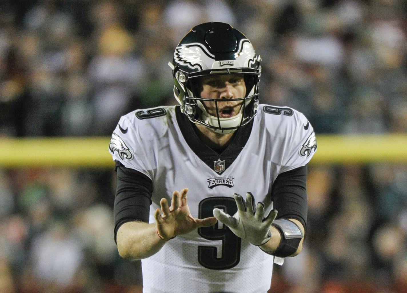 FILE - In this Sunday, Dec. 30, 2018 file photo, Philadelphia Eagles quarterback Nick Foles (9) calls for the snap during the first half of the NFL football game between the Washington Redskins and the Philadelphia Eagles in Landover, Md. Defense is the area with the most depth in this year's free agency class, Monday, March 11, 2019. (AP Photo/Mark Tenally, File)