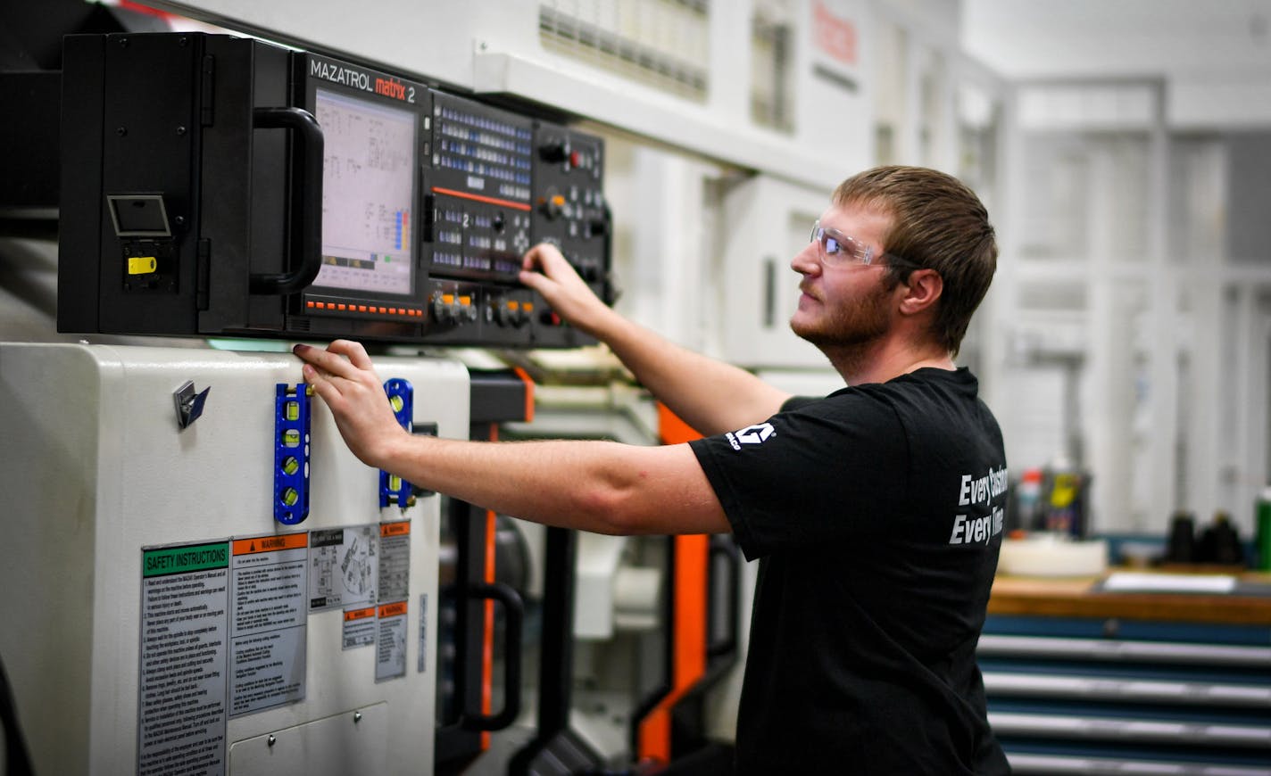 Graco machinist and Hennepin Tech graduate Trevor Klick, 25, operated a Mazak lathe.