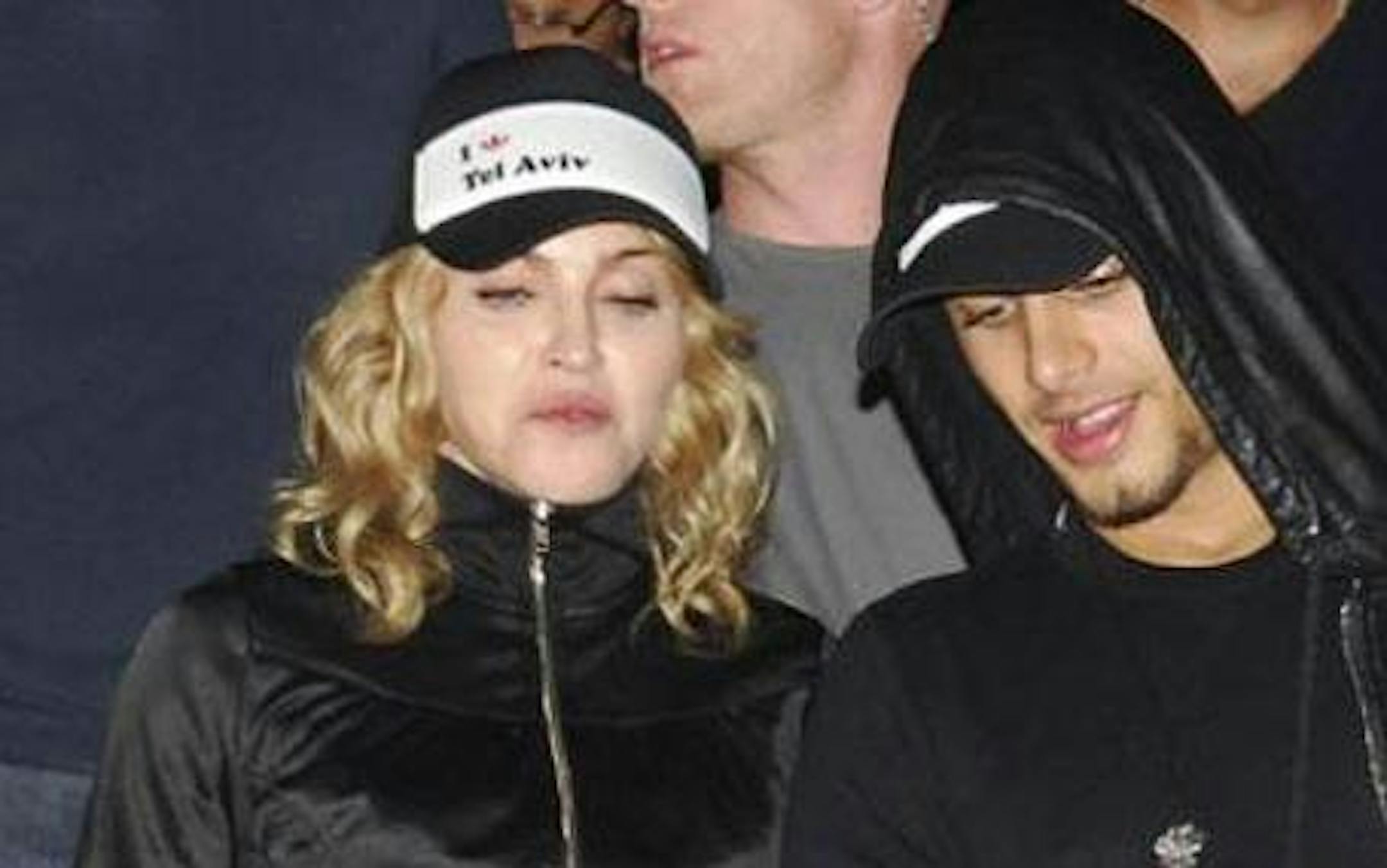 Madonna and one of of her latest guys whose name we've already forgotten (AP Photo)