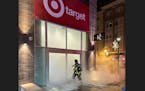 A fire was set inside the entrance to the Target Express on the corner of W. Lake Street and S. Fremont Avenue in Minneapolis about 3:30 a.m. on Jan. 