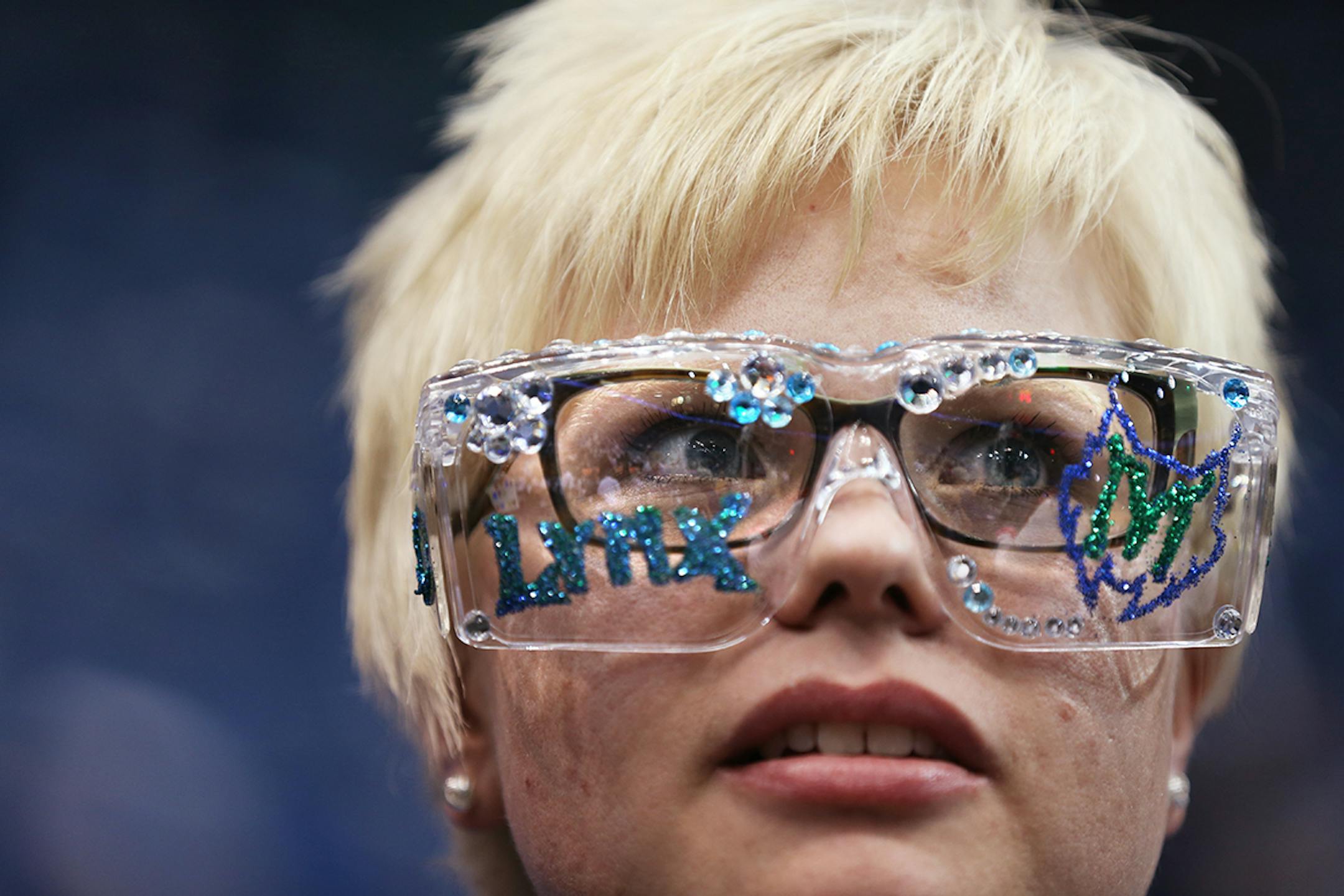 Minnesota Lynx fan Kaitlyn Schleske of Fergus Falls wears goggles that she bedazzled herself before the game.