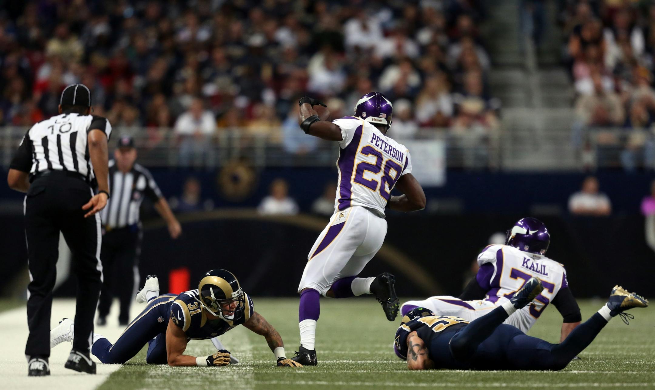 Vikings running back Adrian Peterson still hasn't changed his tune on chasing Eric Dickerson's NFL rushing record of 2,105 yards. With two games left, Peterson has 1,812 yards, 294 shy of breaking the record.