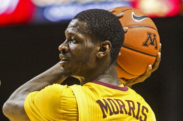 The University of Minnesota's Carlos Morris (11) during his team's 84-64 win over Western Carolina Friday, Dec. 5, 2014, at Wiliam's Arena on the Univ