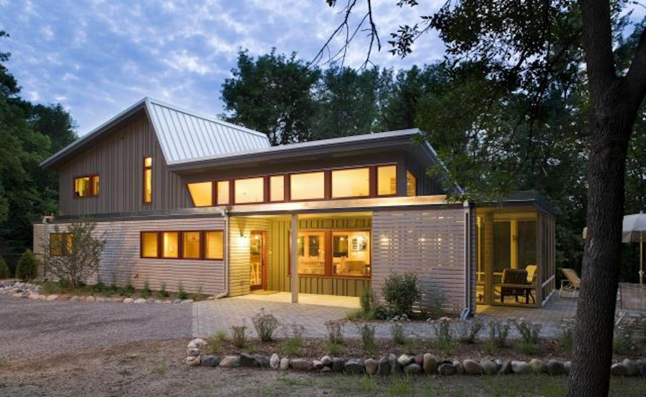 Bands of south-facing windows create a glowing entry in this contemporary "green" home by architect Bryan Anderson.