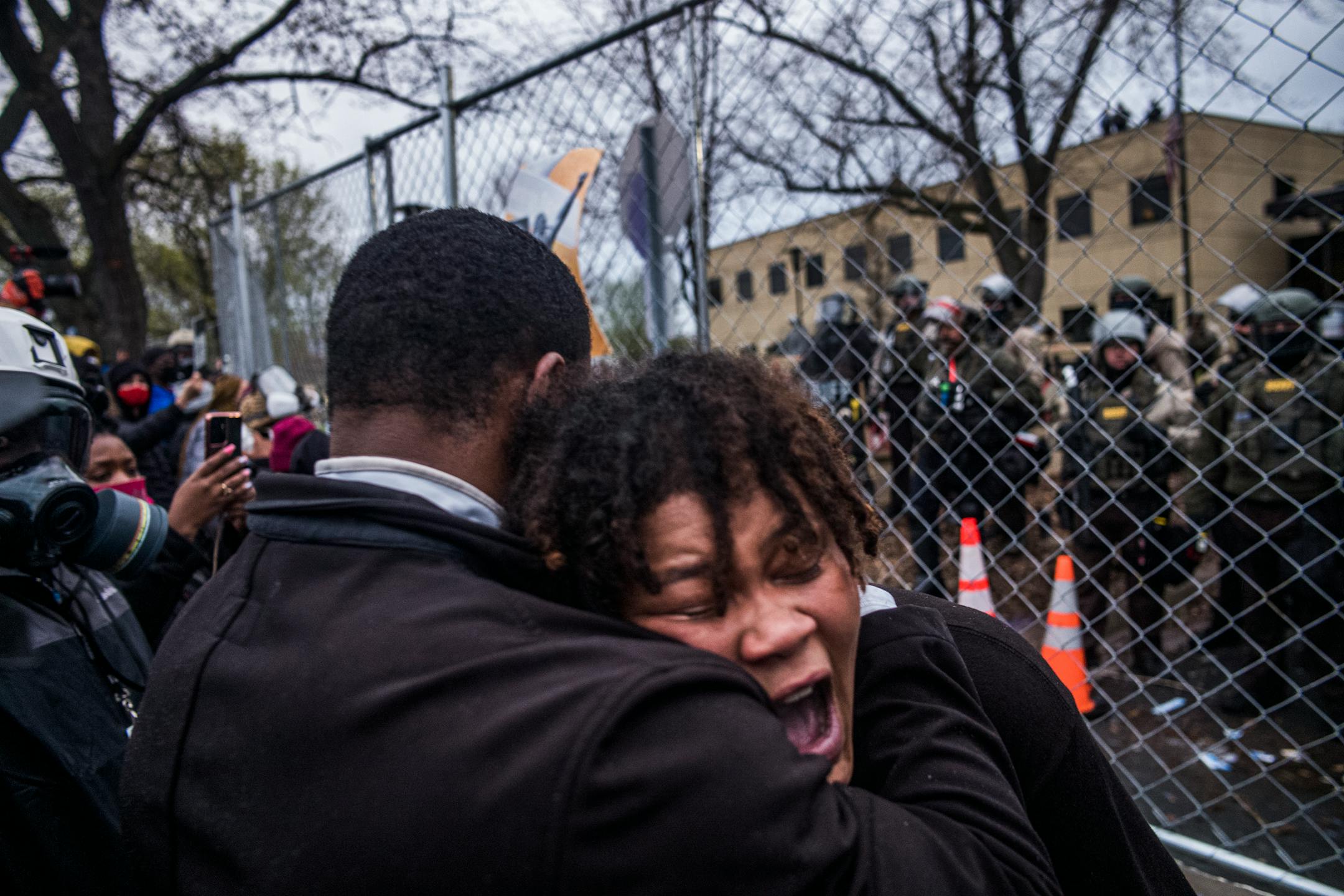 People protest near the Brooklyn Center Police Department in response to the fatal police shooting of Daunte Wright, Wednesday, April 14, 2021 in Brooklyn Center, Minn. Former Brooklyn Center police officer Kimberly Potter was charged with second degree manslaughter after the shooting.