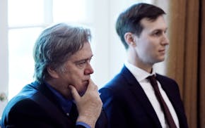 Jared Kushner, right, and Steve Bannon listen during a Cabinet meeting in the Cabinet Room of the White House, on June 12, 2017, in Washington, D.C. (