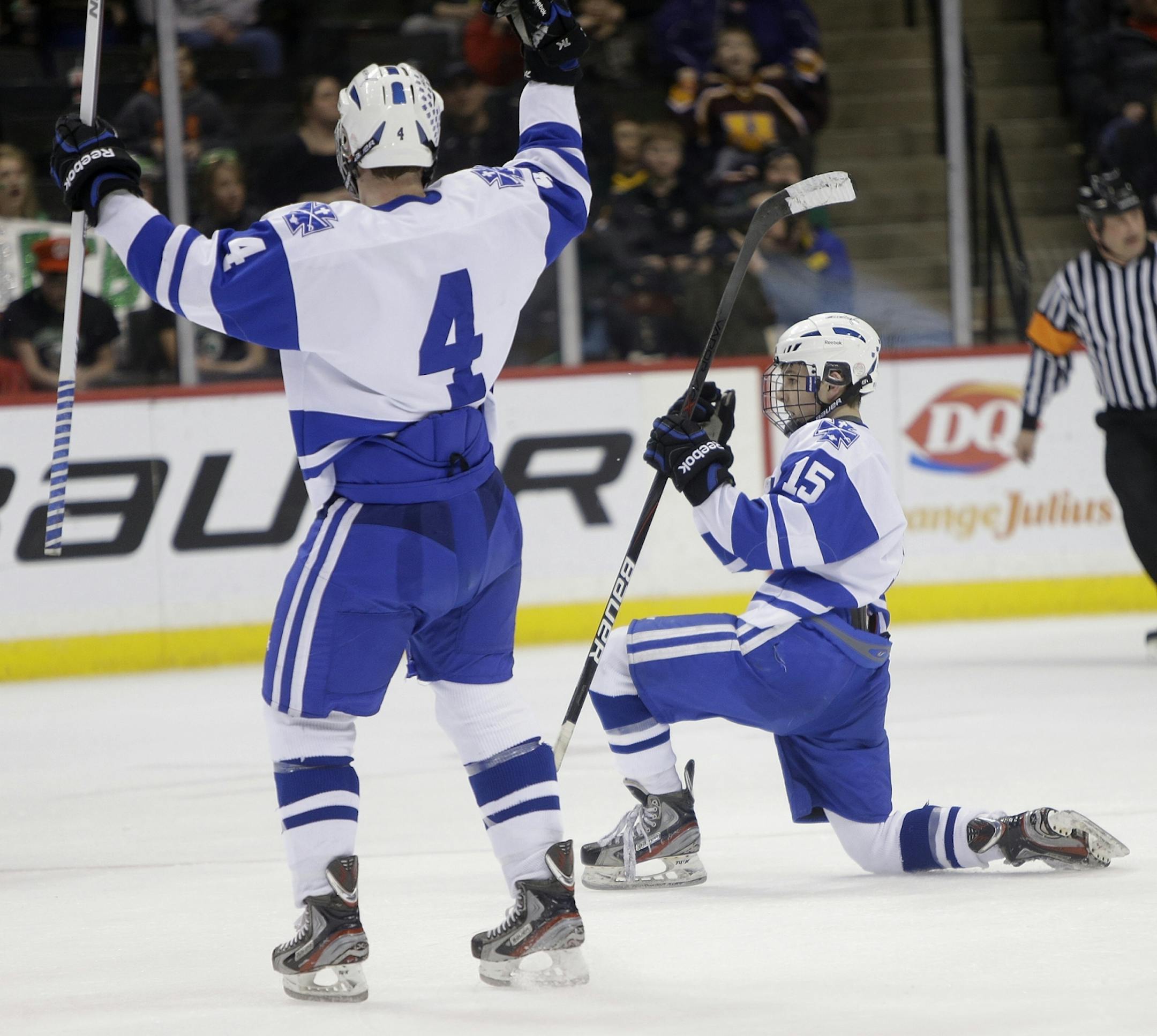 St. Thomas Academy's Tommy Novak, right, and Wyatt Schmidt celebrated Novak's goal during the first period of the Class 1A boys' hockey state tournament semifinals at the Xcel Energy Center, Thursday, March 8, 2013 in St. Paul, MN.(ELIZABETH FLORES/STAR TRIBUNE) ELIZABETH FLORES � eflores@startribune.com