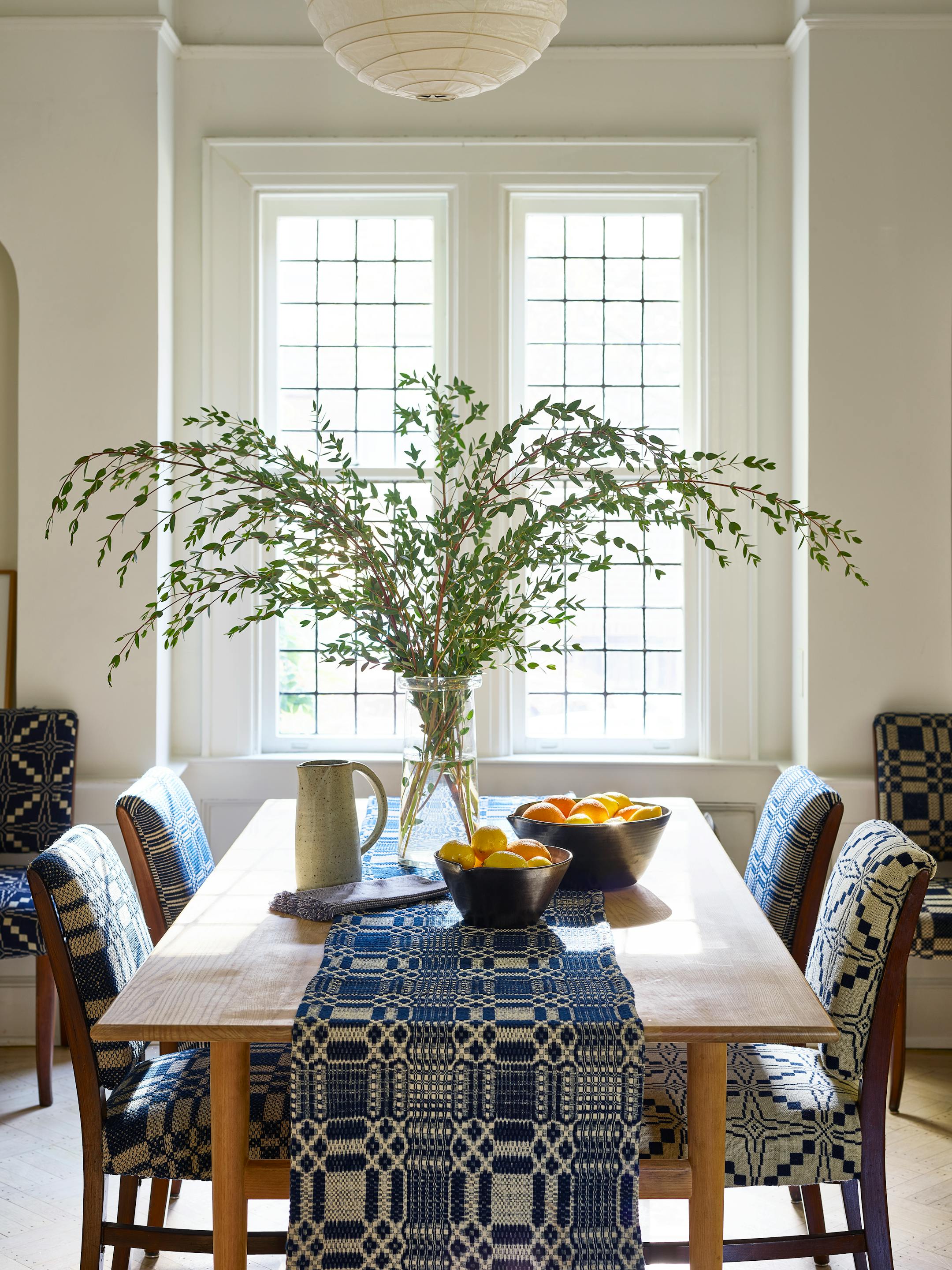 BC-ASK-MARTHA-BLANKETS-COVERLETS-ART-NYTSF — Hans Wegner for Carl Hansen &amp; Son CH327 dining table in Oak Lacquer (similar to shown), $6,700, danishdesignstore.com. Eric Bonnin Kam bowls in Black, $135 and $65, ericbonninceramics.com. Bob Dinetz Pistachio pitcher, $218, bloomist.com. (Frank Frances/Martha Stewart Living Online) — ONLY FOR USE WITH ARTICLE SLUGGED — BC-ASK-MARTHA-BLANKETS-COVERLETS-ART-NYTSF — OTHER USE PROHIBITED.