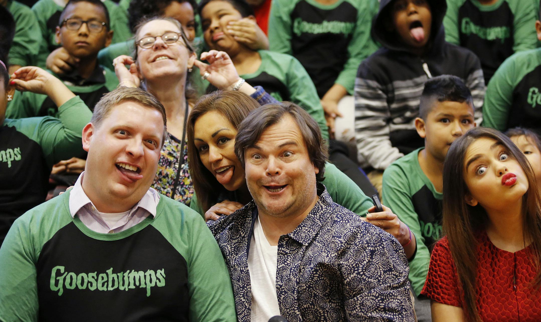 At Richard R. Green Central Park School in Minneapolis, Jack Black and the cast of Goosebumps made a surprise appearance after a screening of the film. On the far right is actor Odeya Rush and on the left is principal Matthew Arnold. ] Richard Tsong-Taatarii/rtsong-taatarii@startribune.com ORG XMIT: MIN1509301515514886