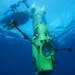 This February 2012 handout photo provided by National Geographic shows the DEEPSEA CHALLENGER submersible begining its first test dive off the coast o