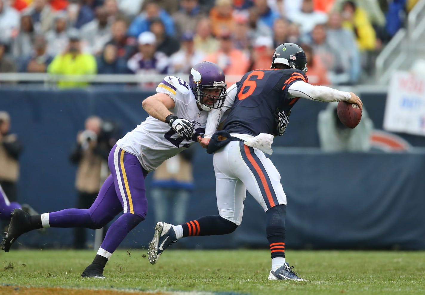 The Minnesota Vikings faced the Chicago Bears at Soldier Field in Chicago on a rainy Sunday afternoon, September 15, 2013. At halftime they trailed 24-21. Minnesota Vikings defensive end Jared Allen (69) closed in on Chicago Bears quarterback Jay Cutler (6) for second quarter sack that forced turnover that resulted in a Vikings touchdown. ] JEFF WHEELER â€¢ jeff.wheeler@startribune.com ORG XMIT: MIN1309151442283389