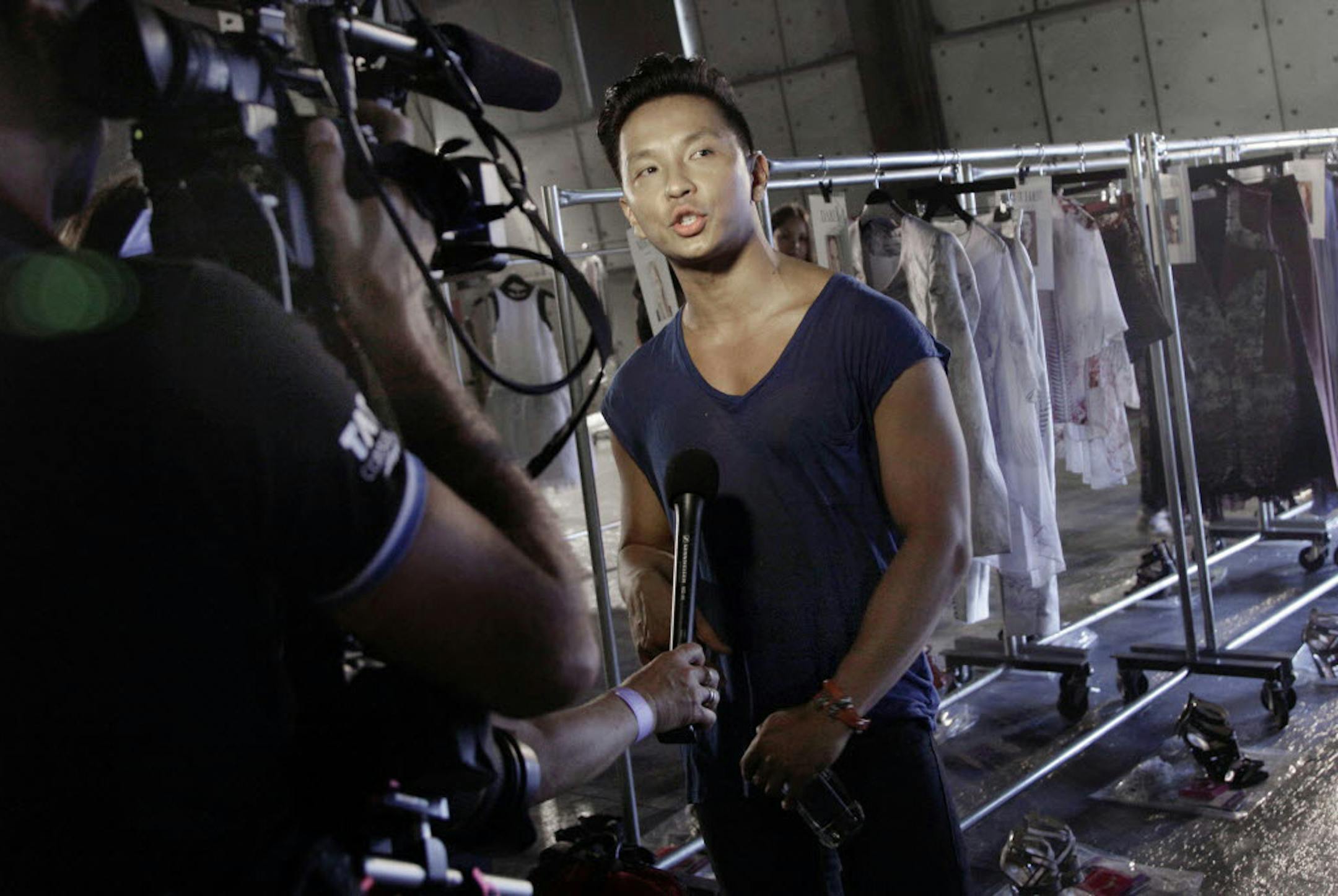 Designer Prabal Gurung is interviewed backstage prior to his Spring 2013 collection being modeled during Fashion Week in New York on Sept. 8.