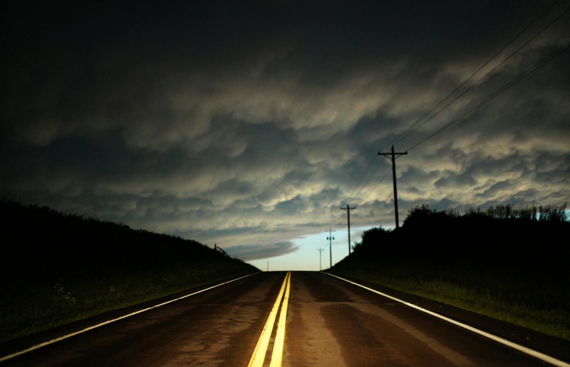 Clouds hung in the sky in Rosemount after Monday evening storms left many areas flooded. Extreme rains have become common this summer in Minnesota.