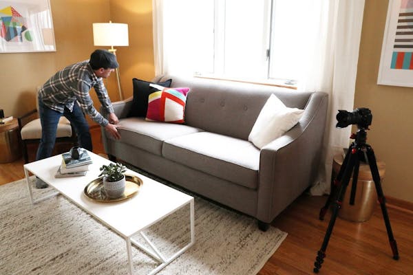 Jason Boyd tidied up as he photographed a home for listing.