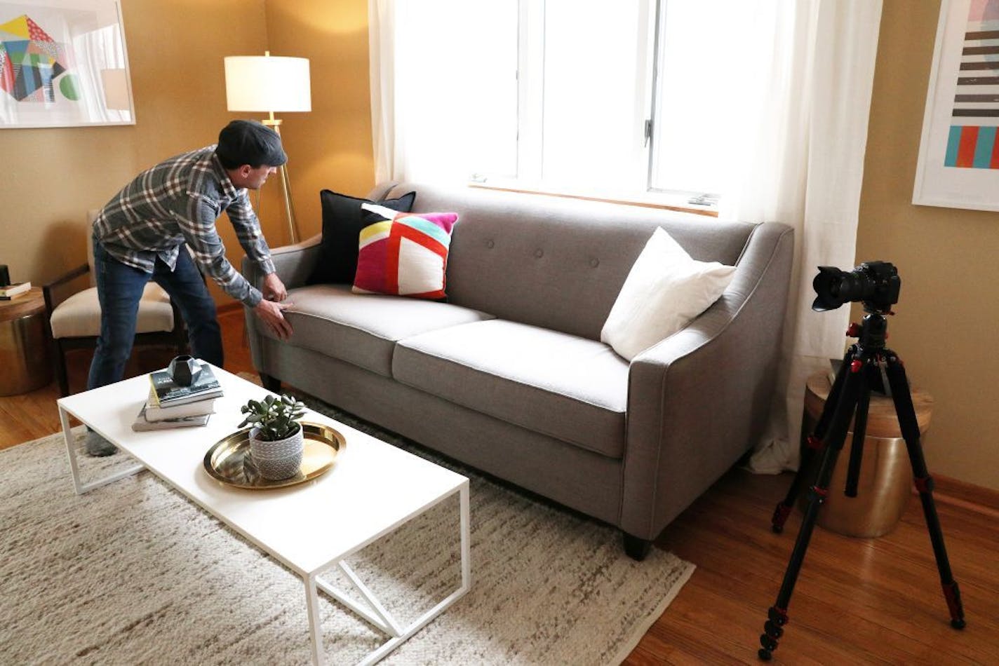 Jason Boyd tidied up as he photographed a home for listing.