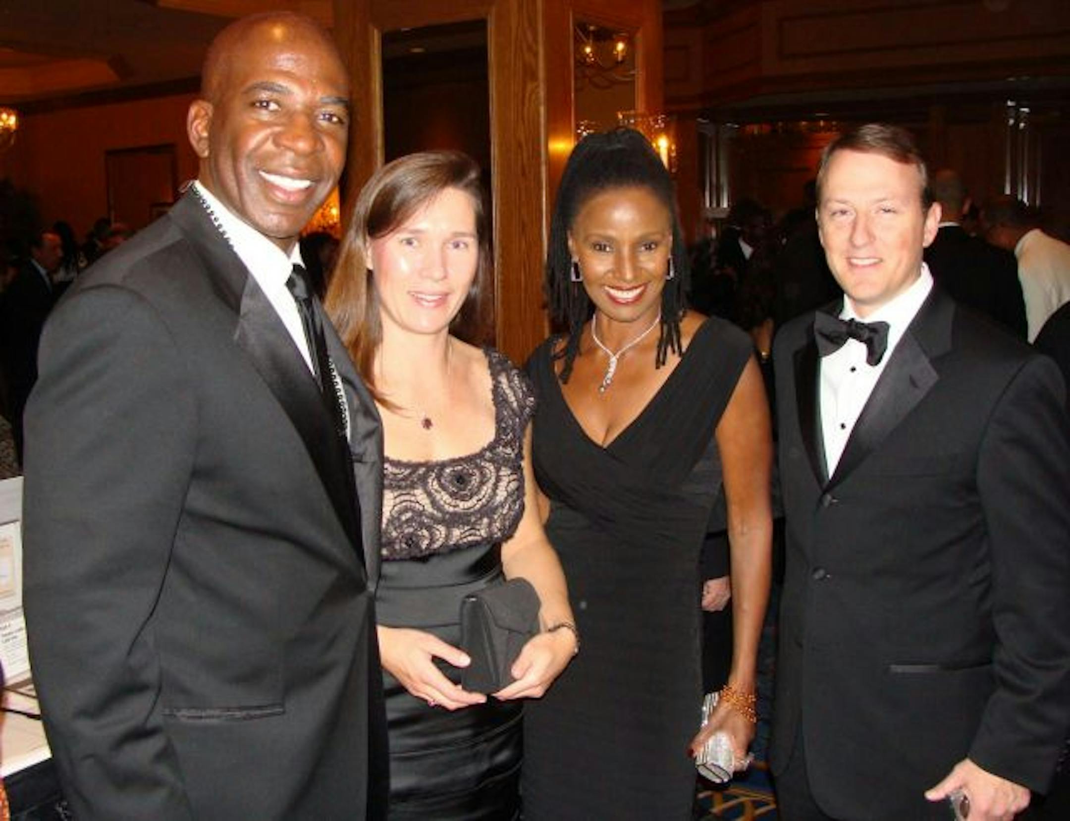 The annual Metropolitan Economic Development Association MEDA Gala, "The Fiesta Latina," at the Hilton in Minneapolis. Dan Gasby(far left) and B. Smith (second from right) with MJ and Tim Coats, vice president at General Mills