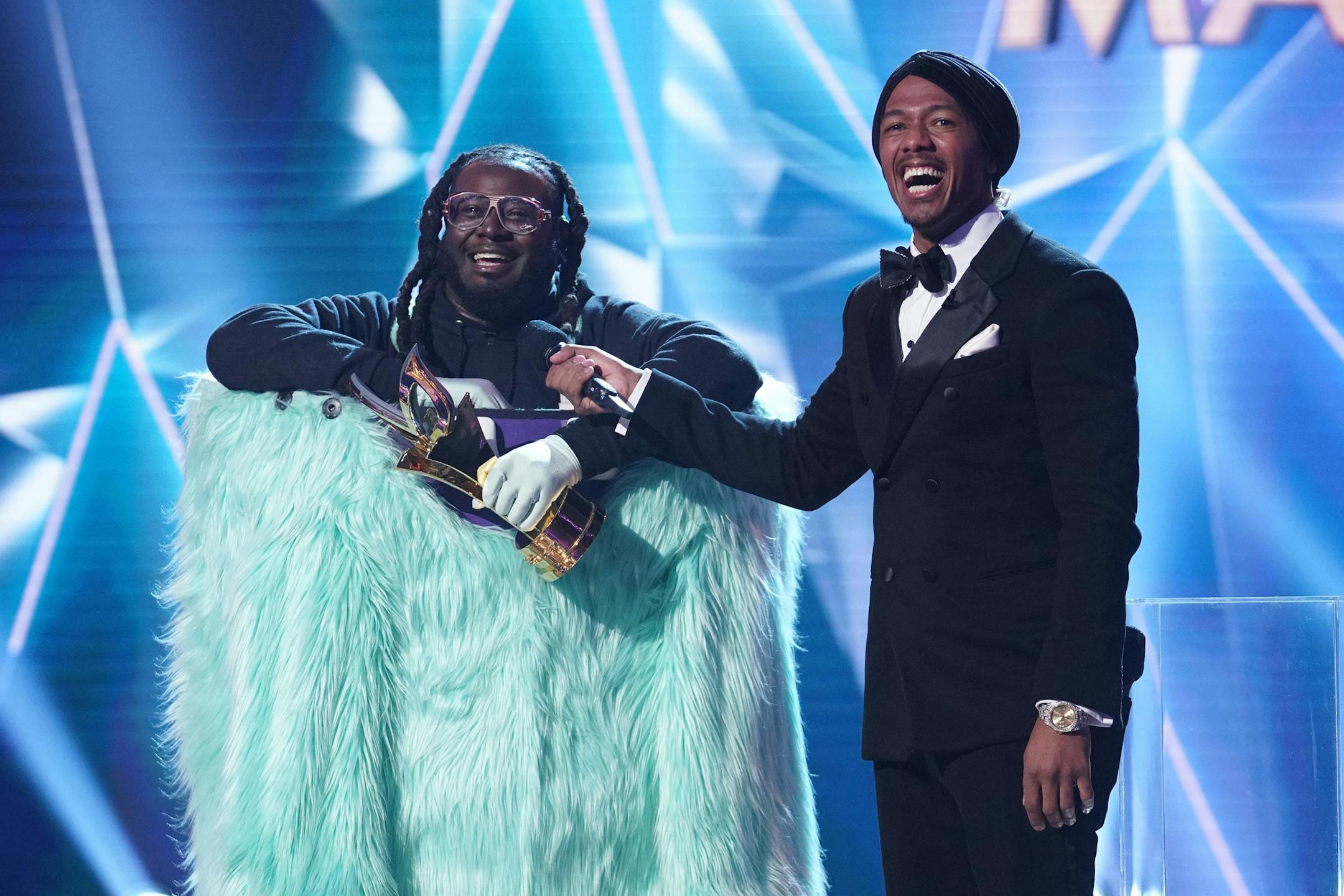 THE MASKED SINGER: L-R: T-Pain and host Nick Cannon in the special two-hour “Road to the Finals / Season Finale: The Final Mask is Lifted” season finale episode of THE MASKED SINGER airing Wednesday, Feb. 27 (8:00-10:00 PM ET/PT) on FOX. © 2019 FOX Broadcasting. CR: Michael Becker / FOX.