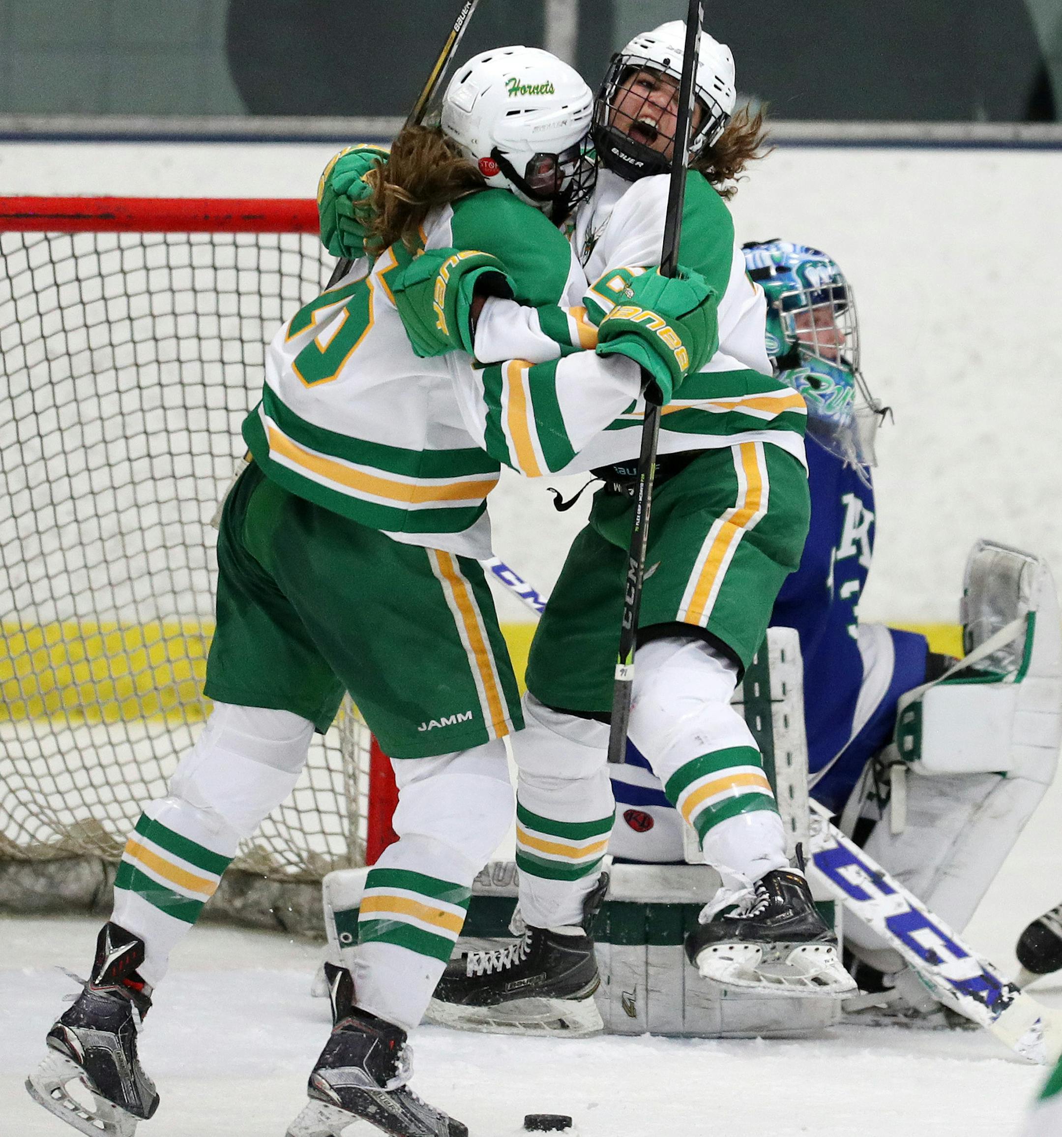 Edina High School forward Aliyah Lance (22) and Edina High School forward Emily Oden (16) celebrated after scoring in the second period. ] ANTHONY SOUFFLE ï anthony.souffle@startribune.com Players competed in an MSHSL Class 2A girls hockey game between Edina High School and the Blake School Friday, Feb. 16, 2018 at the Parade Ice Garden in Minneapolis.