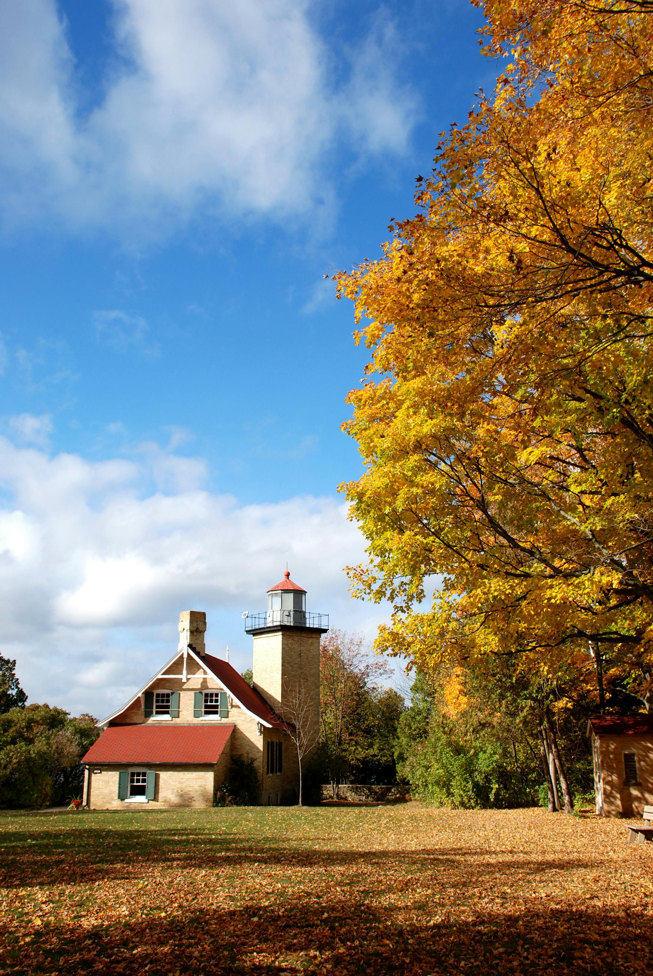 Eagle Bluff Lighthouse in fall located in Peninsula State Park.