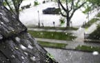 Hail pounds a roof as a severe storm rolls through the Twin Cities in May 2022.