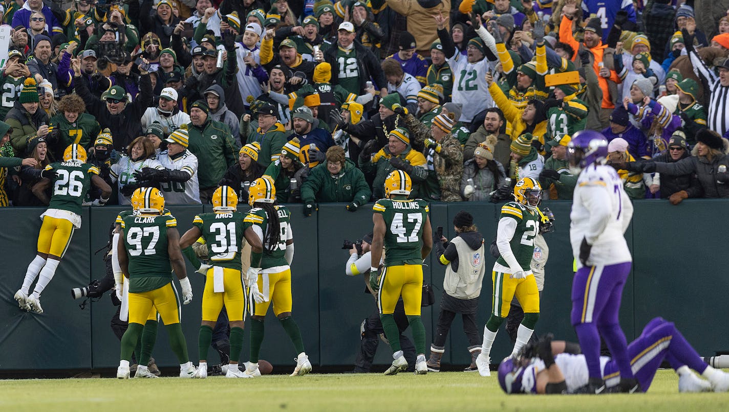 Green Bay Packers safety Darnell Savage (26) jumps into the stands for a "Lambeau Leap" after he intercepted the ball in the first quarter the Minnesota Vikings take on the Green Bay Packers at Lambeau Field, in Green Bay, Wis., on Sunday, Jan. 1, 2023. ] Elizabeth Flores • liz.flores@startribune.com