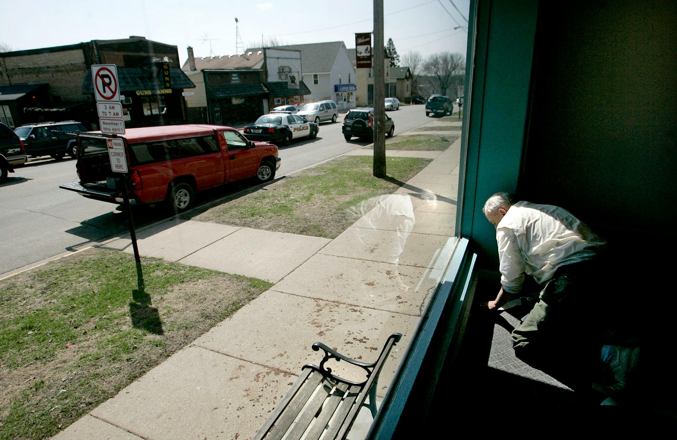 Jay Gregg, who has been in the floor-covering business since 1976, installed carpet Tuesday in a laundromat in St. Bonifacius. Gregg, who was working with his son Wayne, said he would like to see St. Bonifacius leave Hennepin County and form its own county.