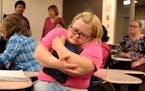 Students who are part of the first class of developmentally-disabled students to graduate from Bethel University took a final exam in "life skills" as
