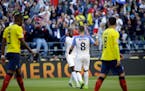 USA&#x2019;s Gyasi Zardes is congratulated by Clint Dempsey, 8, after scoring his side&#x2019;s second goal against Ecuador during a Copa America quar