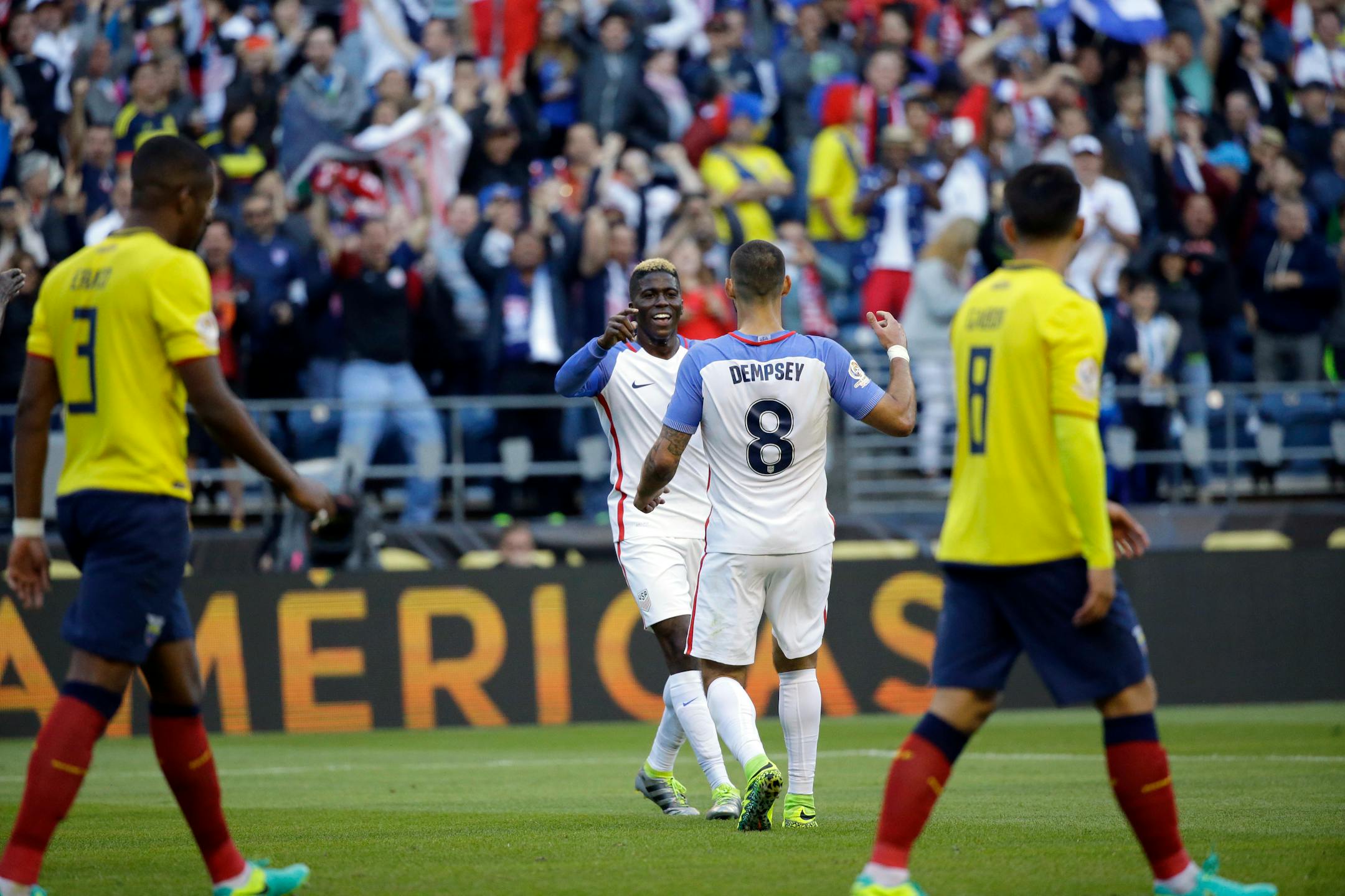 USA&#x2019;s Gyasi Zardes is congratulated by Clint Dempsey, 8, after scoring his side&#x2019;s second goal against Ecuador during a Copa America quarterfinal match Thursday in Seattle.