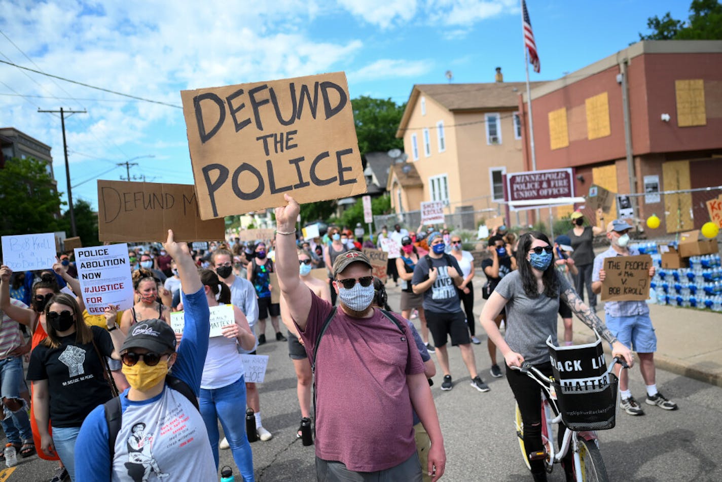 Hundreds gathered outside the Minneapolis Police Union headquarters on Friday to protest against its president, Bob Kroll.