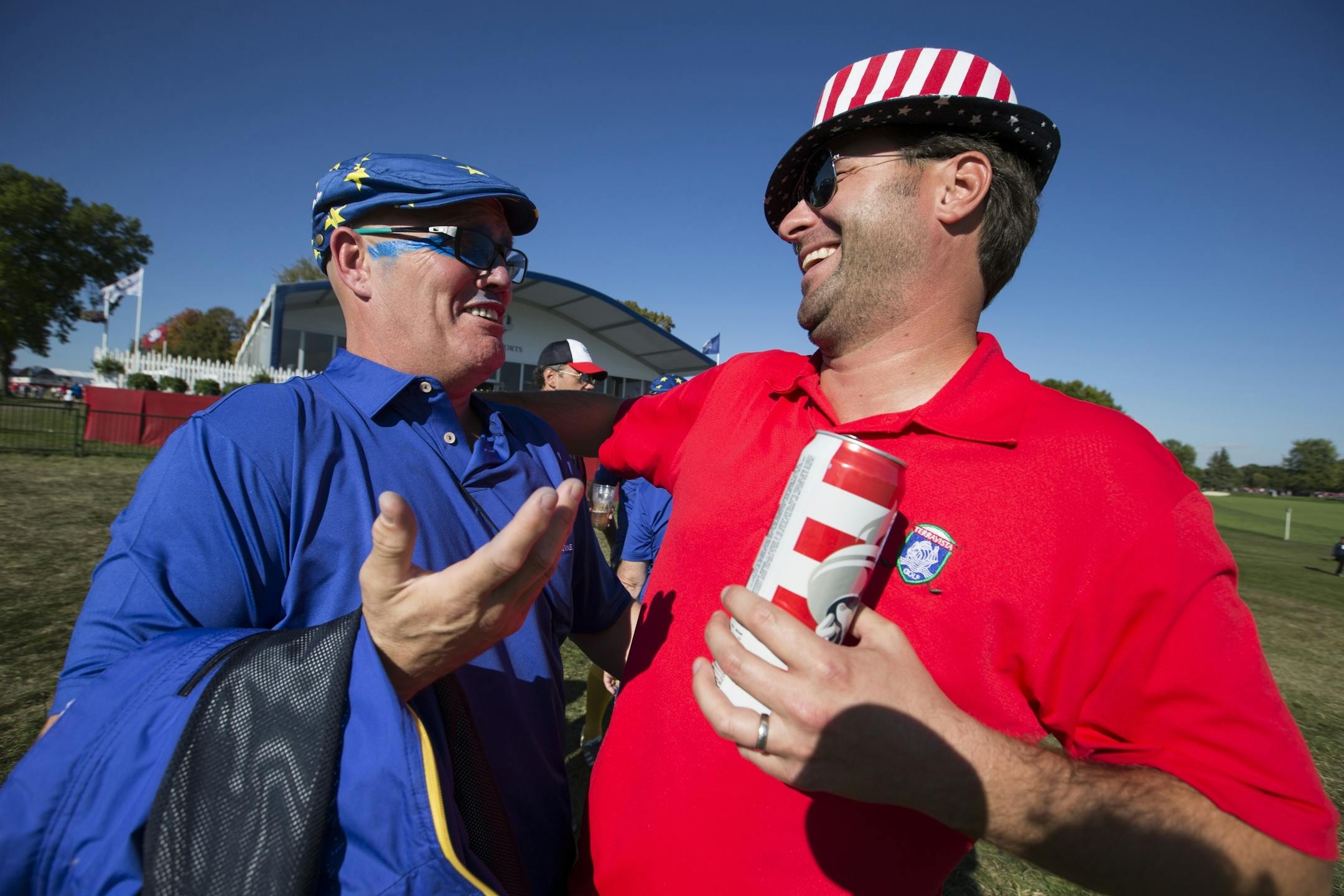Chris Martin, left, of Crawley, England and Jon Kattke of Edina commiserate on the sidelines.