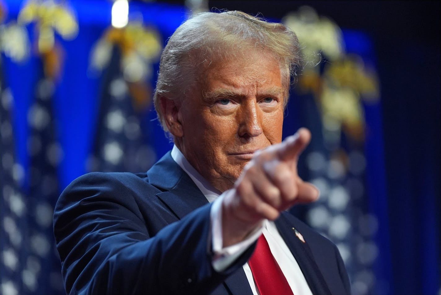 Republican presidential nominee former President Donald Trump arrives at an election night watch party at the Palm Beach Convention Center Wednesday in West Palm Beach, Fla.