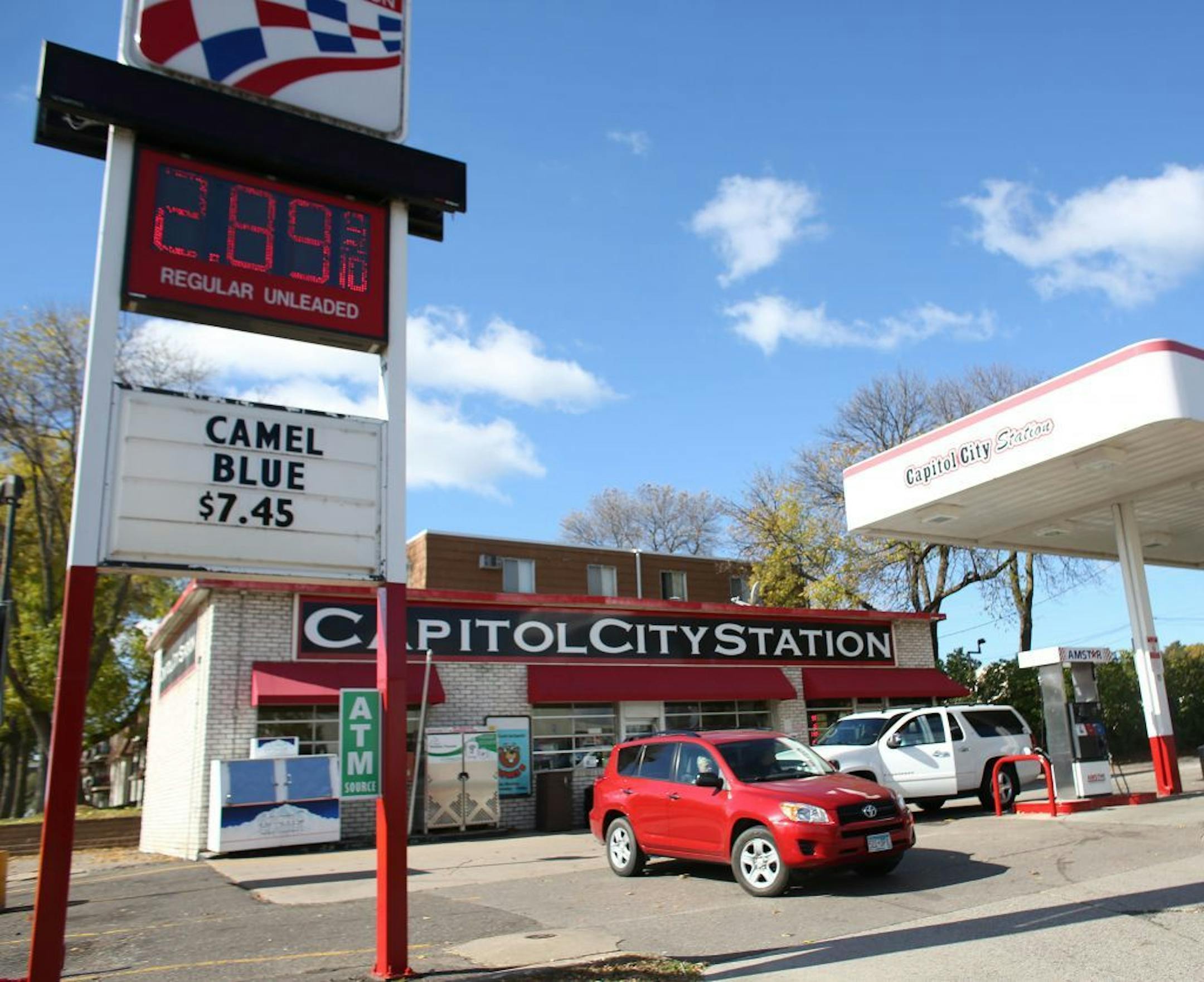 Customers take advantage of low gas prices at Capitol City Station.