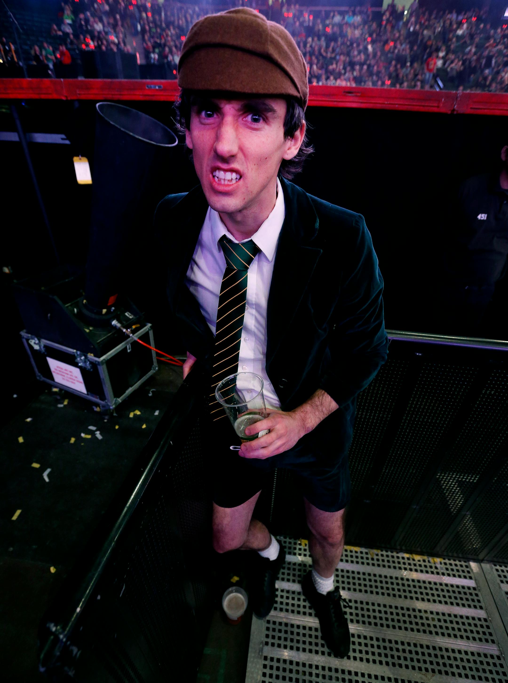 Calvin Shelangoski, 32, of Johnson Iowa dressed as Angus Young for the AC/DC concert at the Xcel Energy Center. ] CARLOS GONZALEZ cgonzalez@startribune.com - February 14, 2016, New St. Paul, MN, Xcel Energy Center, AC/DC Concert